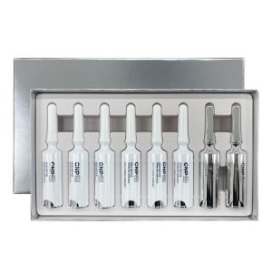 CNP Skin Revive Demeline Ampoule Gift Set featuring revitalizing ampoules and skincare items in premium packaging